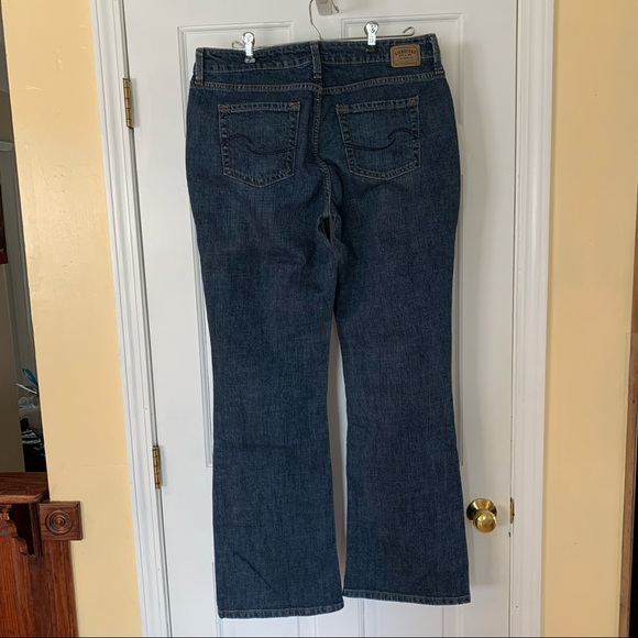 Med blue mid rise bootcut long length signature jeans by Levi’s Strauss. - Picture 3 of 5